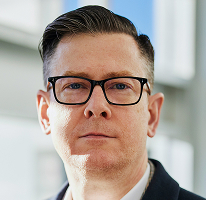 Alexander Hughes, egy kriptókereskedési vállalat vezérigazgatója, portré